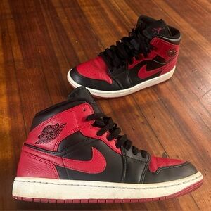 Jordan Black and Gold Sneakers